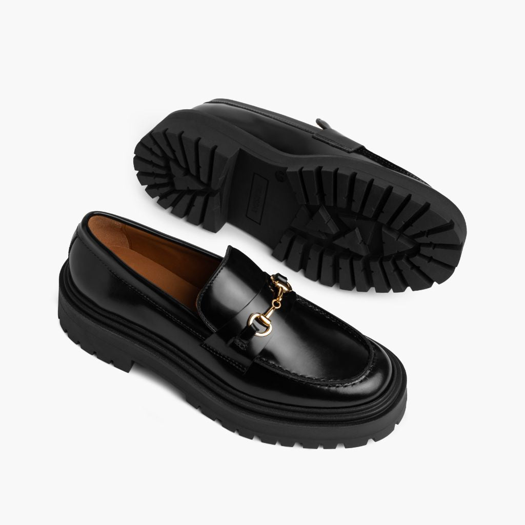 High-Traction Rubber Outsole & Lug Tread Pattern on Women's Penny Platform Black & Gold Leather Loafers