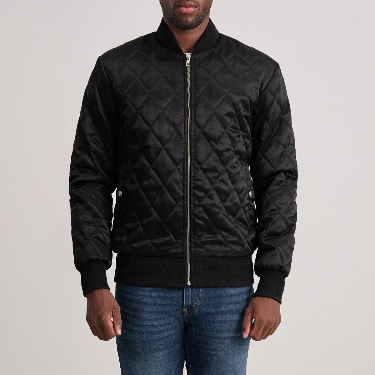 
Danson Quilted Black Varsity Jacket in Black Satin - Front Profile View & Tailored Silhouette | Buy Online