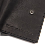 
Solid Antique Brass Hardware & Heavy-Duty Dual Zipper Detail on Torola Full-Grain Leather Card Holder