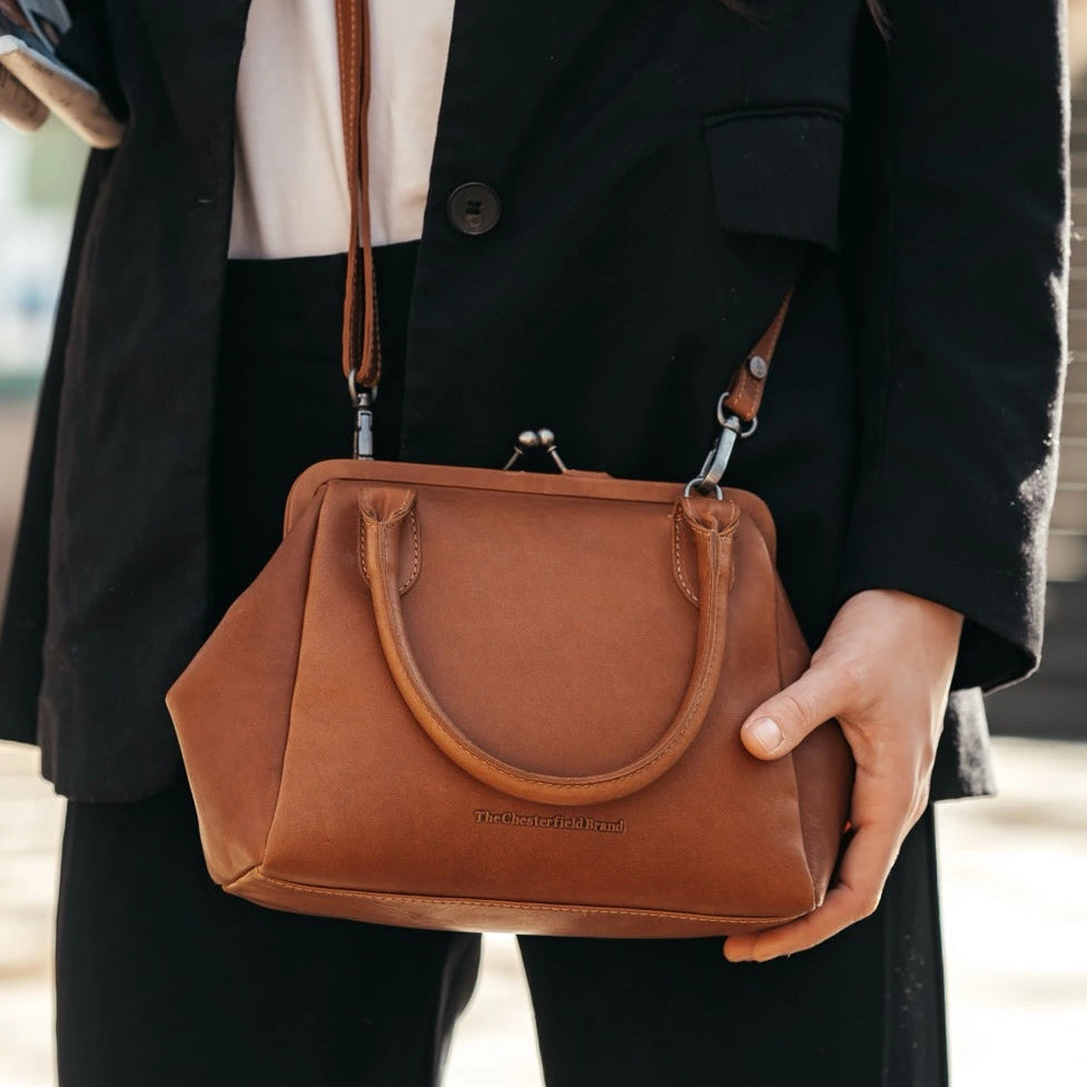 
Tailored Rib Cuffs & Hem Craftsmanship Construction Detail on Chili Full-Grain Leather Handbag